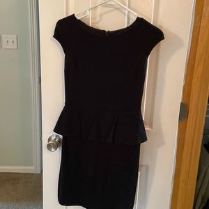 Short sleeve black dress. Lace detail on back.